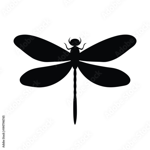Silhouette of a dragonfly with its wings spread wide on a white background