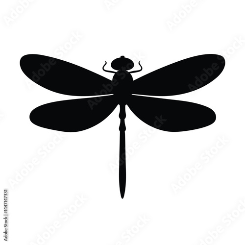 Silhouette of a dragonfly with its wings spread wide on a white background