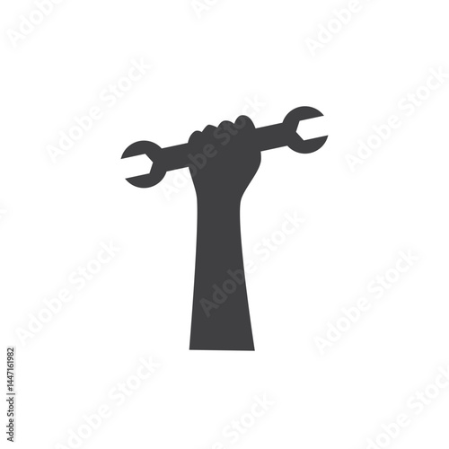 Hand holding a wrench