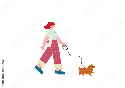 犬を散歩する女性