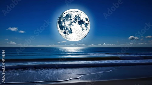 Stunning Nighttime Seascape: The Enchanting Glow of a Full Moon Over Tranquil Waters