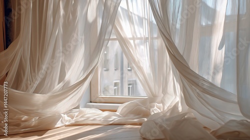 White Sheer Curtains Billowing in Sunlight by an Open Window