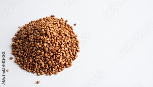 Organic Buckwheat Groats on White Surface