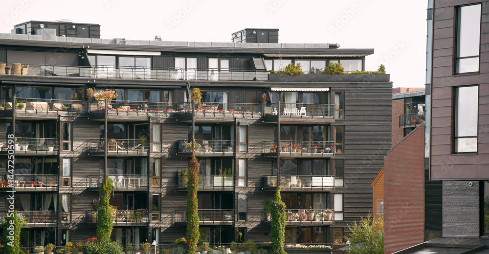 Urban residential complex with balconies and garden