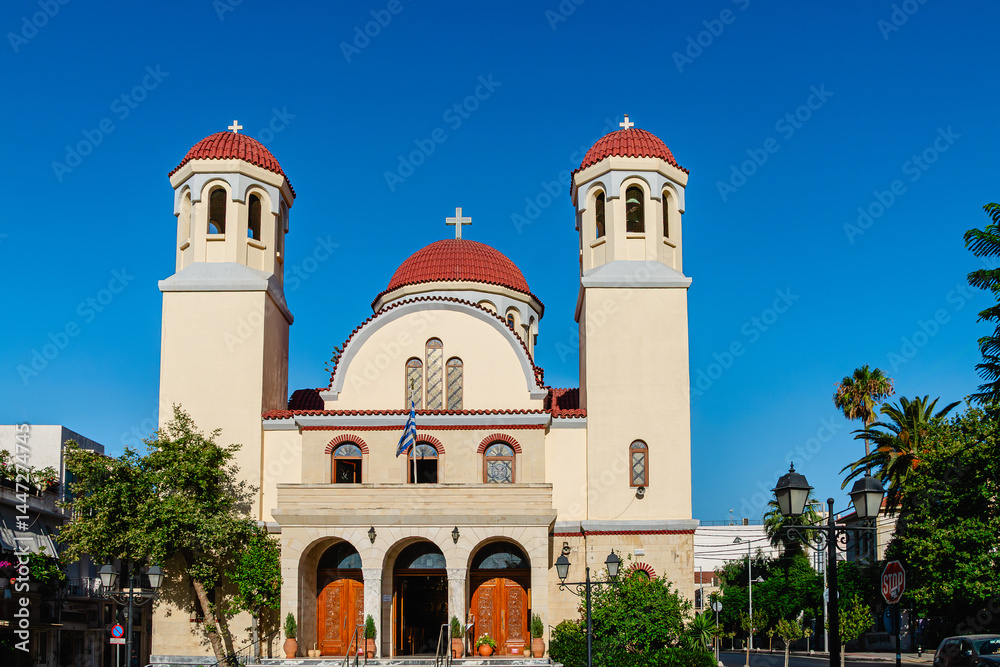 Beautiful church under clear blue sky in vibrant city center