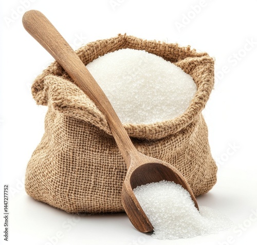 White granulated sugar in a burlap sack with a wooden scoop resting beside it on a clean surface