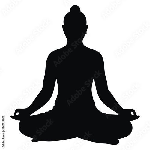 Silhouette of a person in a meditation pose, sitting in lotus position