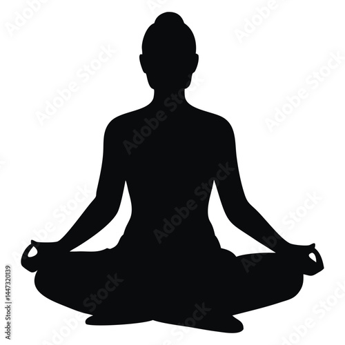Silhouette of a person in a meditation pose, sitting in lotus position