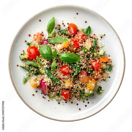 Fresh quinoa salad prepared with colorful vegetables and herbs in a clean kitchen setting during daylight hours