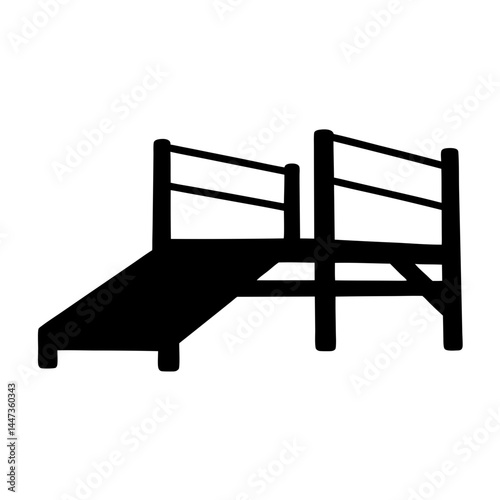 A silhouette of a wooden playground bridge with a ramp and railing