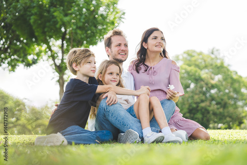 Wallpaper Mural Happy family parent children having picnic outdoor activity. Enjoy happiness moment summer playing together including father mother son and daughter relaxing in the morning sunrise. Torontodigital.ca