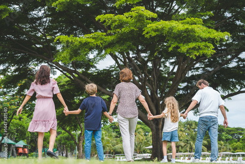 Wallpaper Mural Happy family parent children having picnic outdoor activity. Enjoy happiness moment summer playing together including father mother son and daughter relaxing in the morning sunrise. Torontodigital.ca
