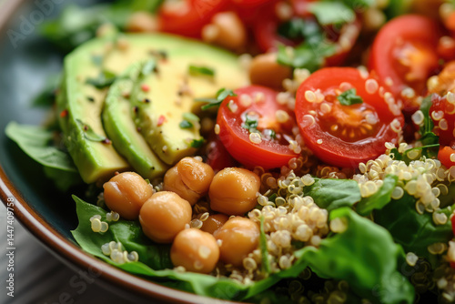 Obraz na płótnie Fresh quinoa salad with chickpeas, avocado, and cherry tomatoes w salonie