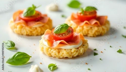 Rice cakes with cream cheese, prosciutto and tomato top view isolated on white background