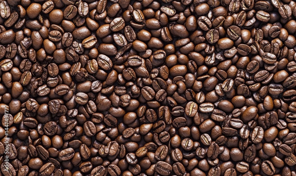 Fototapeta premium Close-up of Roasted Coffee Beans on Dark Background for Beverage Lovers