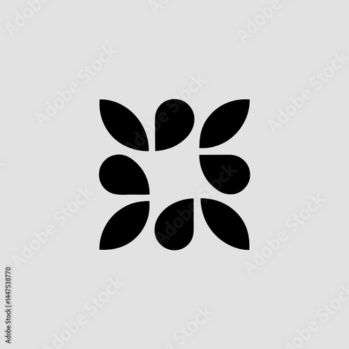 Geometric blossom pattern formed from repeating symmetrical teardrop shapes for artistic design