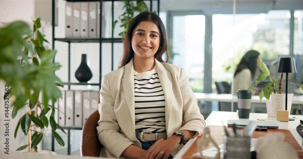Fototapeta premium Business, woman at desk and portrait in office for about us, mission and creative worker. Confident, smile and female editor with career pride, future professional growth or opportunity in publishing