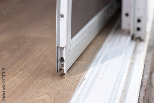 Aluminium sliding  door that comes off bottom track.