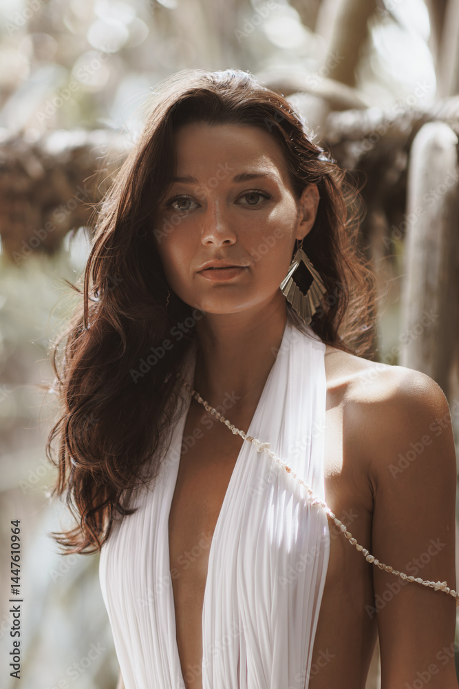 Fashion portrait of serene woman in elegant white swimsuit with pearl accessory and soft lighting - concept for natural beauty, glowing skin, fashion promo, spa, and summer lifestyle visuals.