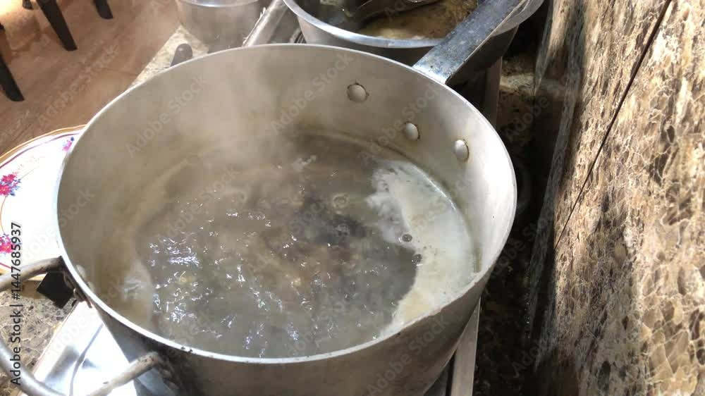 Placuna saddle oysters, also known as windowpane or capiz oysters, are soaked in hot boiling water so that the meat falls out on its own Placuna saddle oysters, also known as windowpane or capiz oysters, are soaked in hot boiling water so that the meat falls out on its own