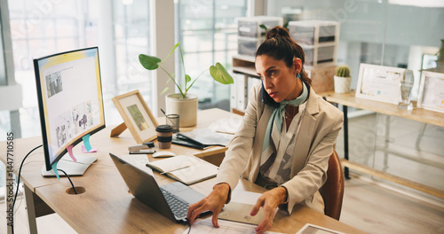 Business, phone call and woman in office, computer and communication for magazine layout. Pc, employee and journalist in workplace, cellphone or conversation with schedule for article and feedback