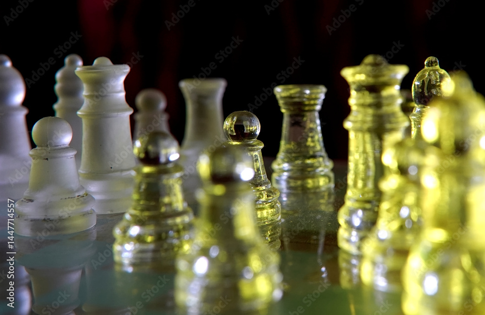 Close-up of a pawn on a glass chessboard Close-up of a pawn on a glass chessboard
