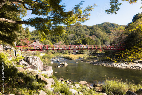 Koran bridge across Tomoe river at Korankei gorge during autumn season