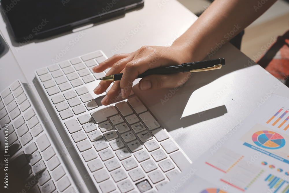 Φωτογραφία Expert woman asian female people review data number costing managerial account prepare monthly actual cost variance report at tax audit office