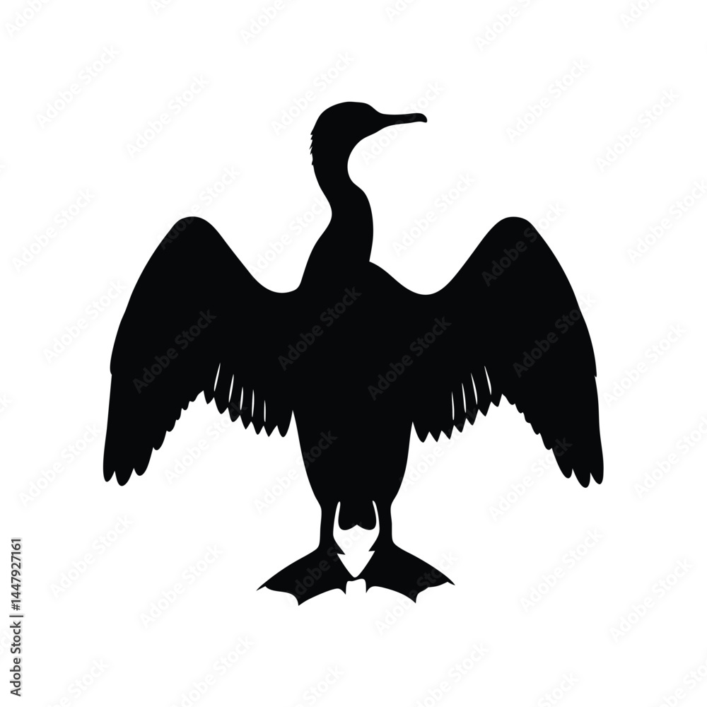 Obraz premium Silhouette of a cormorant bird with wings spread, drying in the sun