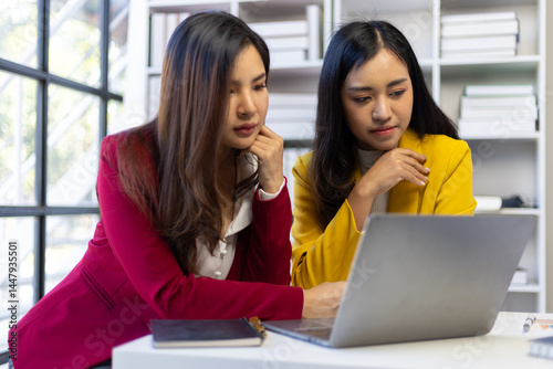 Two female employees are stressed when they receive bad news and are fired.