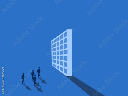 Business team walks and meets a large wall blocking the way of the wall