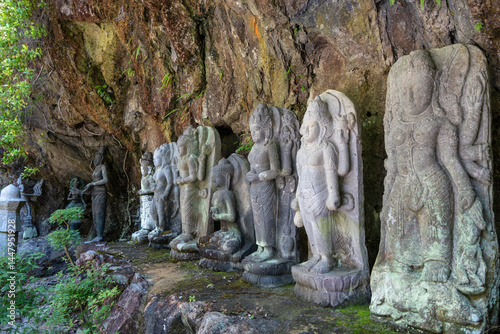 Buddhist statue group at Mitaki-Dera temple in Hiroshima, Japan photo