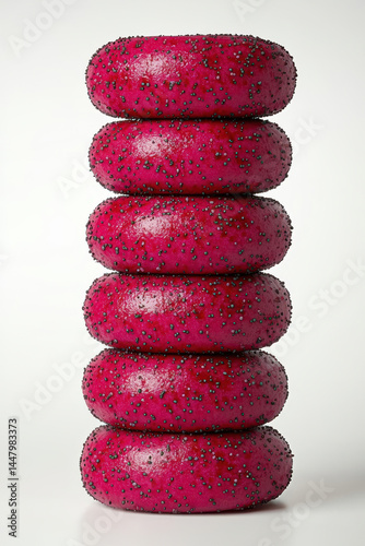 Colorful stack of five vibrant pink donuts with sprinkles, Isolated design on clean white background