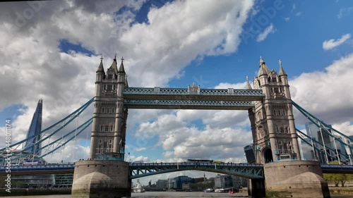 Tower bridge standing majestically on river thames in london