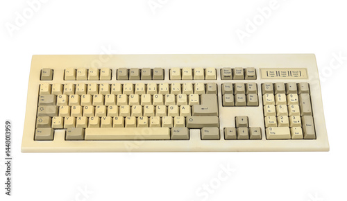 Vintage computer keyboard from the 1990s isolated on white background.