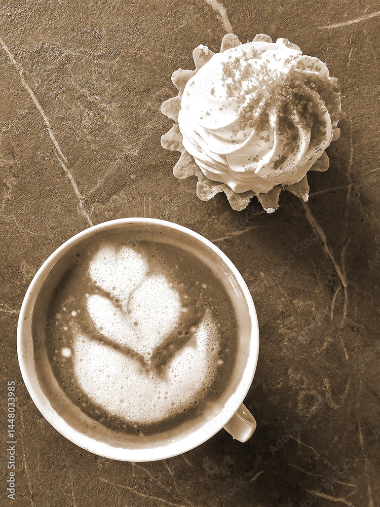 Cup of coffee with heart shape latte artle background