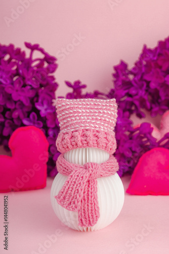 Cute greeting card for Valentine's or Mothers Day. Snowman with handmade hearts and lilac flowers