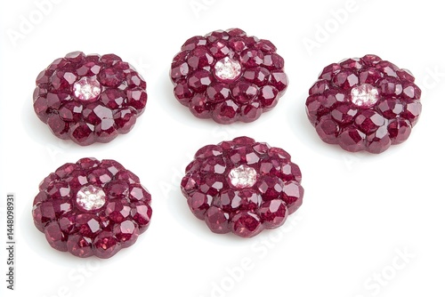 Five decorative buttons with a flower design, deep burgundy color, and clear crystals
