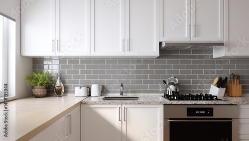 Modern kitchen with white cabinets and gray subway tiles, featuring a cozy and clean design.