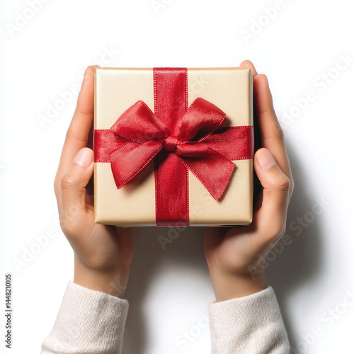 Human hands holding red ribbon gift box festive celebration isolated on white background