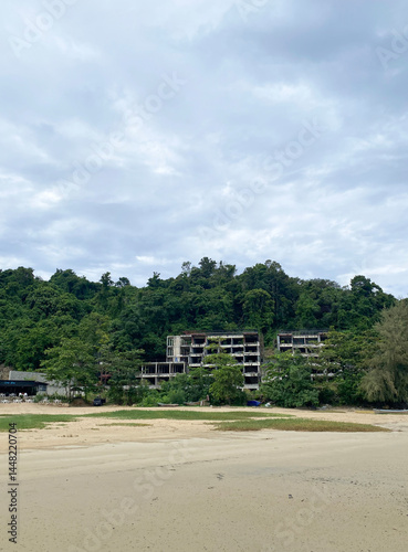 abandoned hotel after tsunami on the beach in Thailand, Phuket. Dangerous development in the tropics, deserted beach
