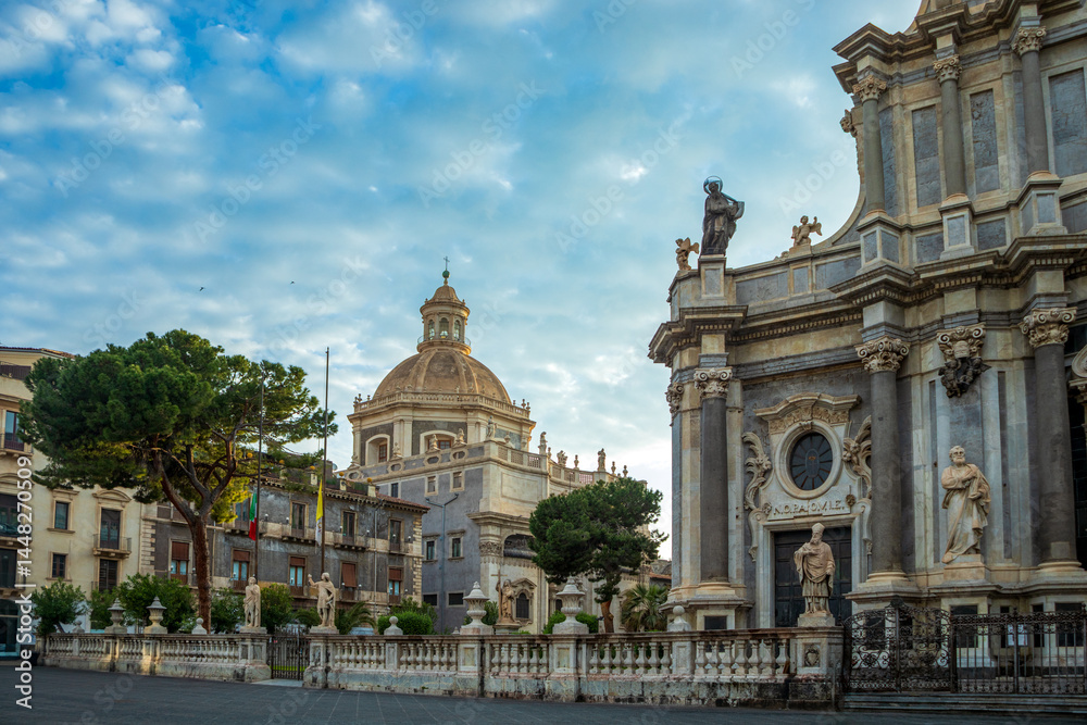 Obraz premium Cathedral Square with the Abbey Church of St. Agatha in Catania, Sicily, Italy, with part of the cathedral facade in the foreground