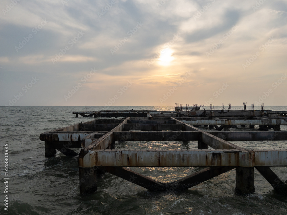 Rugged Unfinished Pier Foundation in Ocean.