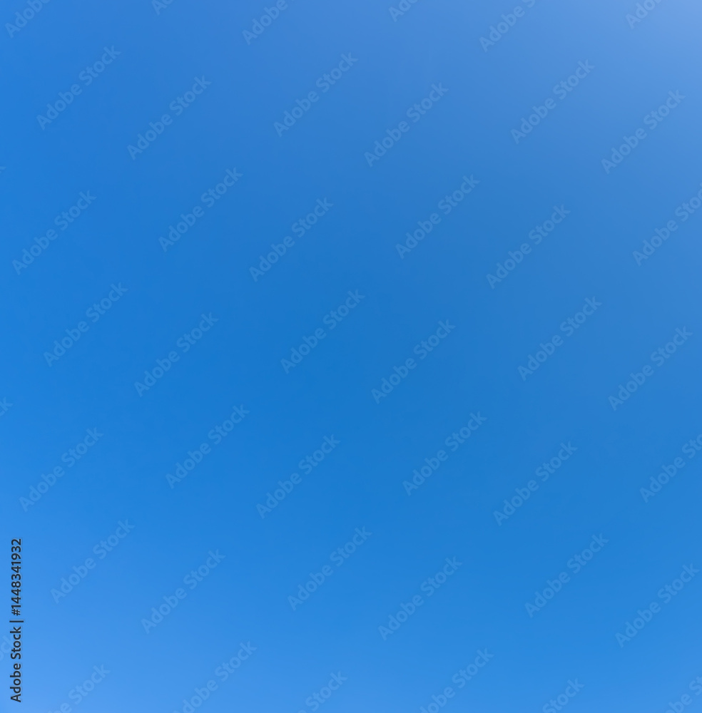 Beautiful light blue sky without clouds in the morning or afternoon on sunny day used as natural background texture in decorative art work Beautiful light blue sky without clouds in the morning or afternoon on sunny day used as natural background texture in decorative art work