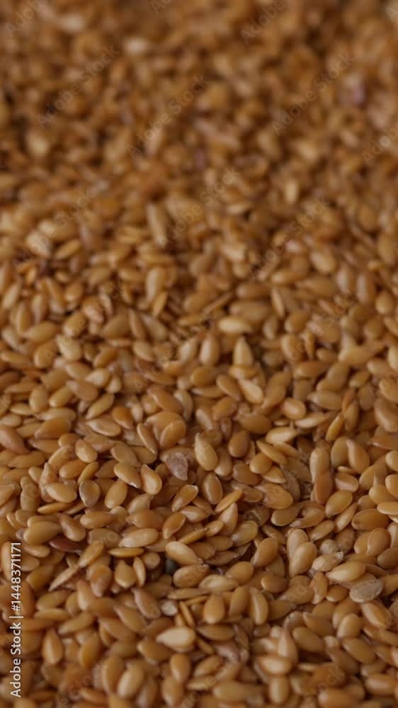 Organic golden flaxseed, linseed grains. Superfood high in fiber. Organic golden flaxseed, linseed grains. Superfood high in fiber.