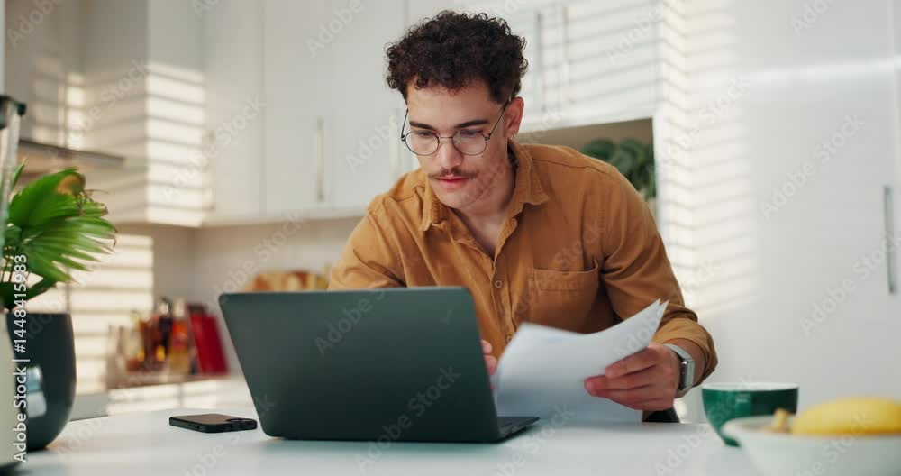Man, laptop and kitchen with documents for finance, expenses or mortgage payments at home. Male person, freelancer or remote worker with computer or paperwork for bills, invoices or house insurance Man, laptop and kitchen with documents for finance, expenses or mortgage payments at home. Male person, freelancer or remote worker with computer or paperwork for bills, invoices or house insurance