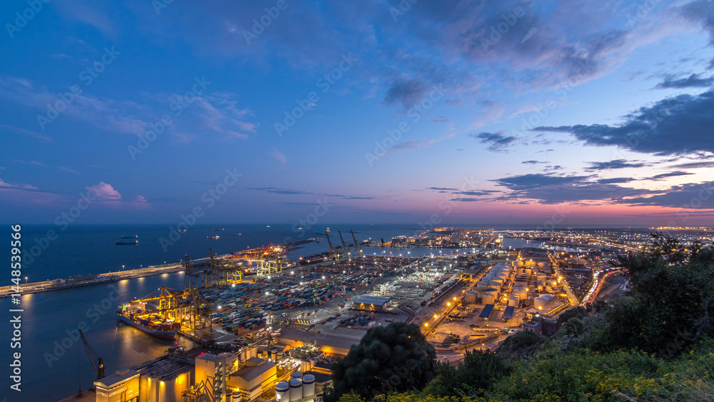 Obraz premium Seaport and loading docks at the port with cranes and multi-colored cargo containers day to night timelapse