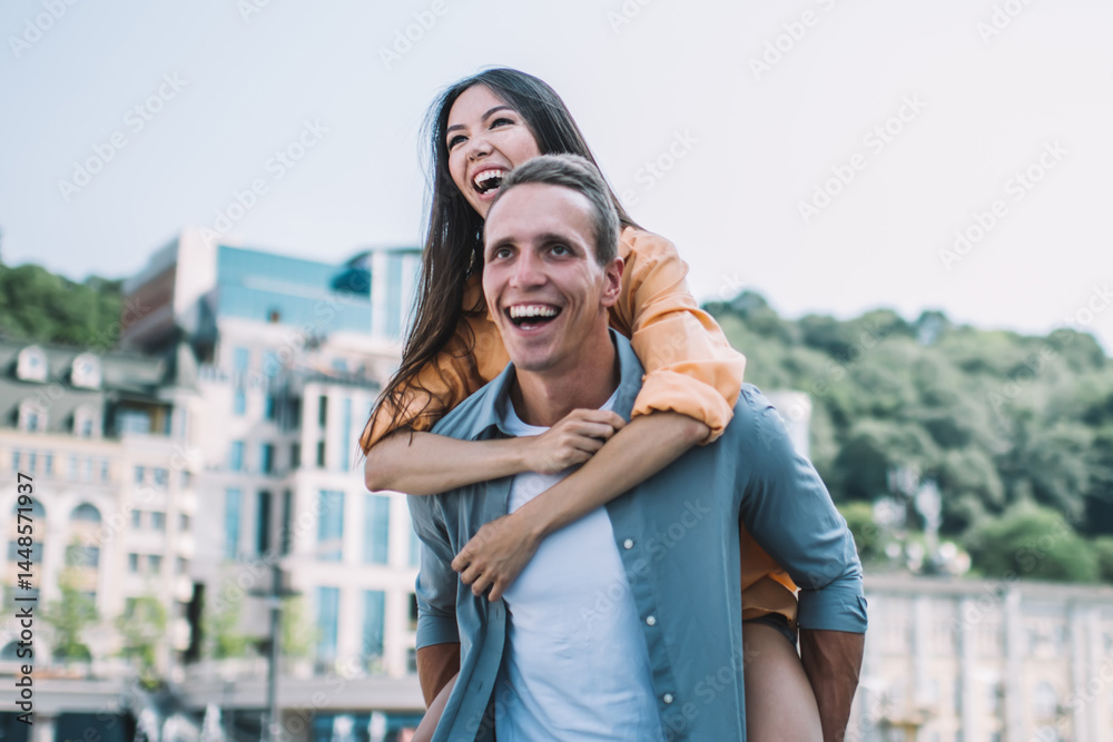 Young couple enjoying summer day in city
