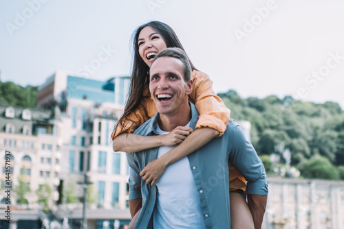 Young couple enjoying summer day in city