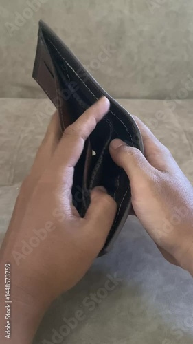 business money wallet cash finance open holding economy poor financial. credit empty poverty hand showing debt sad broke bankruptcy leather. person purse savings crisis problem pay payment bankrupt.
